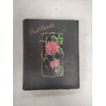 POSTCARDS. Old floral pattern album containing approx. 129 old postcards