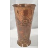 Morecambe H.E.C.,  Arts & Crafts copper vase of flared form, with repousse stylised floral