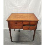 19th century mahogany work table with a deep drawer, flanked with two small drawers on turned