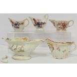 Group of five 18th/early 19th century porcelain creamers, comprising: panelled cream or sauceboat