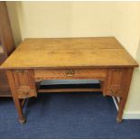 Arthur Simpson of Kendal. Arts & Crafts oak writing desk of rectangular form with frieze drawers