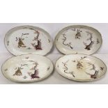 Two pairs of 18th century English porcelain shallow oval plates in the "Yellow Tiger" pattern, the