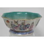 Chinese Qing Dynasty Famille Rose lobed footed bowl, the exterior with continuous panel of figures
