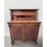 Victorian mahogany chiffonier with a shelved top on turned reeded column supports, above two doors