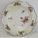 18th century Chelsea porcelain plate of lobed circular form with hand painted polychrome enamel