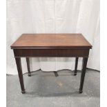 George III mahogany fold over top table, rectangular form, on reeded tapered supports. 75cm high,