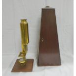 Late 18th / 19th century single pillar brass microscope, by H Levo, London, on mahogany base, 40cm