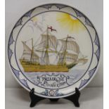 Poole Pottery charger of circular form, the polychrome hand painted decoration commemorating the