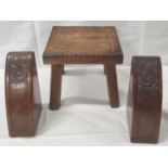 Pair of Arthur Simpson Arts and Crafts oak bookends with carved foliate motifs, 16cm high, also