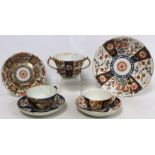 Three pieces of 18th century Worcester porcelain decorated in the Imari palette, comprising: twin