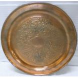 Keswick School of Industrial Arts, Arts & Crafts circular copper tray with repousse decoration of