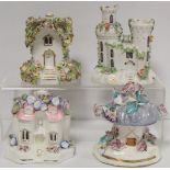 Three Coalport style cottage pastel burners and another in the form of a castle, the largest 12.