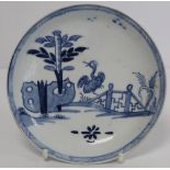 18th century Bow porcelain blue and white "Banana Tree, Stork and Fence" pattern saucer, painted no.