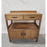 Arthur Simpson, Kendal, Arts and Crafts oak buffet table with two drawers above an open recess and