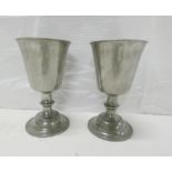 Pair of 19th century pewter chalices, each raised on turned stem & circular foot, 22cm high.