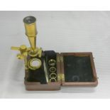 Early 19th century Gould style microscope, unsigned, in mahogany case, 9cm x 8cm, with four lenses.