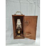 Microscope lamp by Swift, London, with pottery shade (repaired), in case, 36cm.