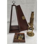 18th century Culpeper type brass microscope, unsigned, on scrolling supports in mahogany pyramidal