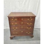 George III mahogany bachelors` chest of drawers, with a pull out slide above four graduated