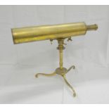 Early 19th century brass Gregorian telescope, apparently unsigned, upon column and tripod,