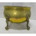 19th century brass oval jardiniere, with shell paterae, raised on four animal paw feet, with ball