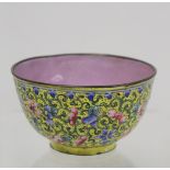 Chinese Canton enamel wine cup of circular form, the yellow ground profusely decorated with