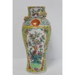 Late 19th/early 20th century Chinese Famille Rose vase of baluster form with panels of birds in