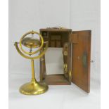 Late Victorian brass gyroscope in fitted case, by Elliott Bros., 40 Strand, London, 25cm height.