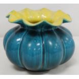 Linthorpe pottery vase of squat lobed globular form with turquoise and yellow glazes, impressed mark