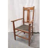 Arts and Crafts oak elbow chair with pierced splat back, pierced stylised motif. Stamped FW and No