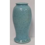 Ruskin Pottery vase of baluster form with flared base, with mottled turquoise and green glaze,