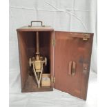 Microscope by Tho. D King, Opticians, Bristol, upon tripod supports, in mahogany case, c1850, 45cm.