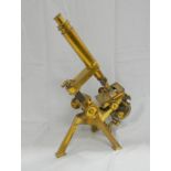 Brass microscope by Powell & Lealand, Euston Road, London, 47cm, without accessories or case.