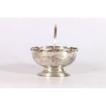 George V silver sugar basket with swing-handle, raised on stepped oval socle base by Carrington &