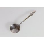 Art Nouveau silver spoon with stylised floral finial by Liberty and Co., London, 1899, 86g.