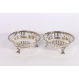 Pair of Art Nouveau period Edward VII pierced silver bon-bon dishes by Charles S Green & Co Ltd,