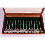 Set of thirteen contemporary silver apostle type spoons, each finial depicting one of the twelve