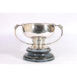 Silver twin-handled prize cup trophy with lion mask handles, inscribed 'Presented by Oban