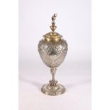 Dutch white metal urn and non matching cover, the cover mounted with figure and the body covered