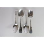 Set of four George IV Irish silver tablespoons of fiddle pattern with elephant monogram and rat tail