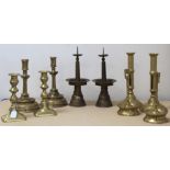 Pair of brass pricket candlesticks and four other pairs of brass candlesticks.  (10).