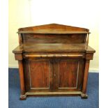 19th century rosewood chiffonier with a shelved back raised on balustrade columns, above a drawer