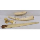 Late 19th/early 20th century African carved ivory pipe with mask terminal and ribbing to body,