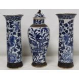 Chinese crackle glaze blue and white vase of baluster form decorated with scrolling dragons
