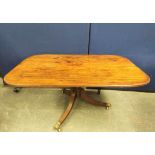 19th century mahogany tilt top breakfast table raised on a turned column and quadruped feet with