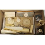 Small collection of antique ivory and bone items including shoehorns, button hooks, blotter, shaker,