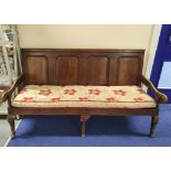 18th century oak settle, four panel back rest, slatted seat, on cabriole front supports, with scroll
