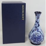 Modern Moorcroft Pottery "Blue Chrysanthemum" pattern bottle vase in the Florian Ware style,