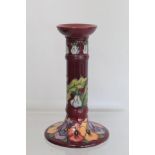 Modern Moorcroft Pottery "Pansy" pattern candlestick, designed by Rachel Bishop, impressed and