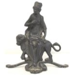 Cast iron doorstop in the form of Britannia sitting on a lion, with scroll base, 23cm high.